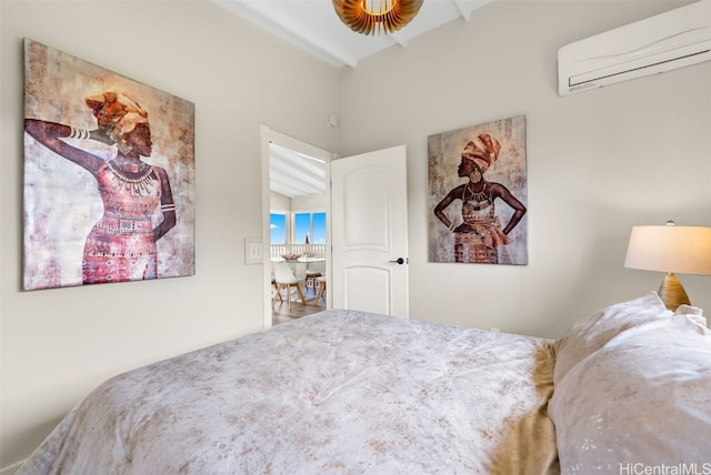 bedroom with a wall mounted air conditioner