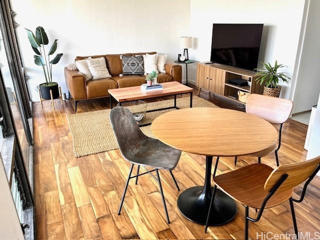 living room with light hardwood / wood-style flooring