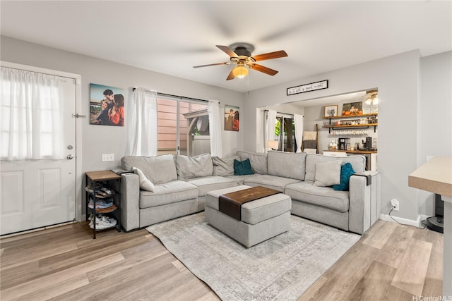 91-338 Makalea St Unit 52, Ewa Beach, HI 96706 - living room with ceiling fan and light wood finished floors