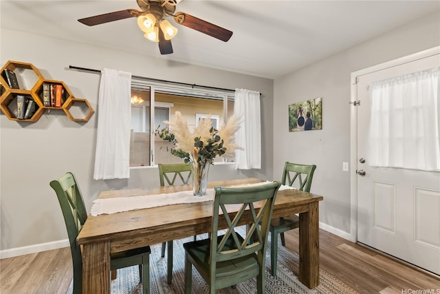 91-338 Makalea St Unit 52, Ewa Beach, HI 96706 - dining area featuring wood finished floors and ceiling fan
