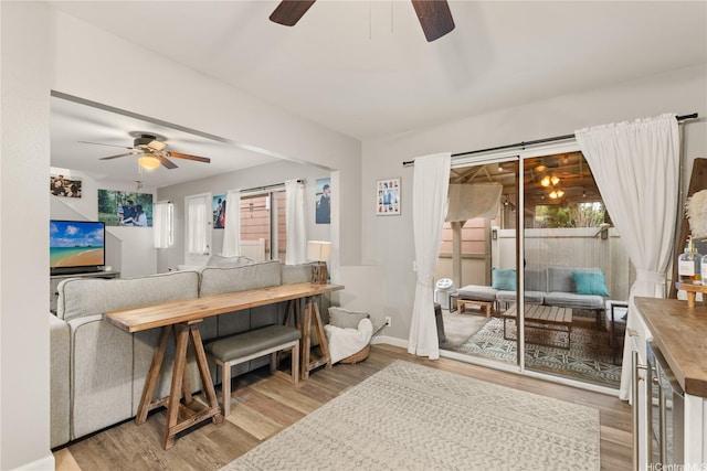 91-338 Makalea St Unit 52, Ewa Beach, HI 96706 - living room with ceiling fan, wood finished floors, and beverage cooler