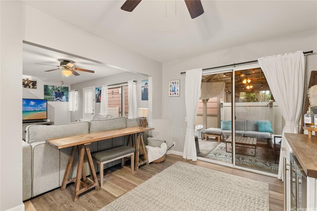 91-338 Makalea St Unit 52, Ewa Beach, HI 96706 - living room with ceiling fan, wood finished floors, and beverage cooler