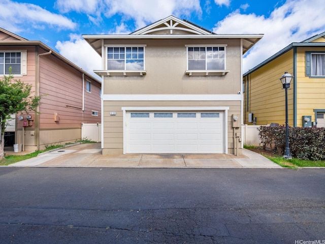 91-338 Makalea St Unit 52, Ewa Beach, HI 96706 - view of front of house with a garage and driveway