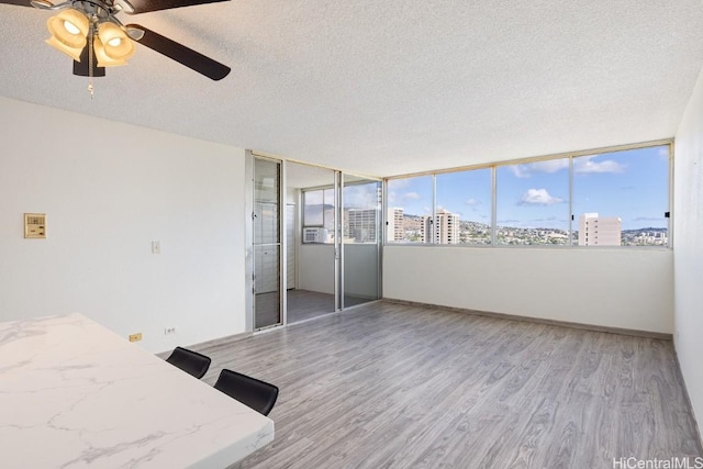 interior space featuring ceiling fan