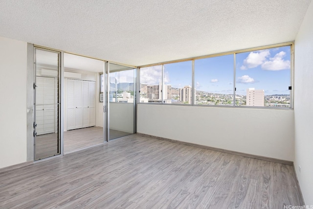 1617 Clark St Unit 702, Honolulu, HI 96822 - unfurnished sunroom with a view of city