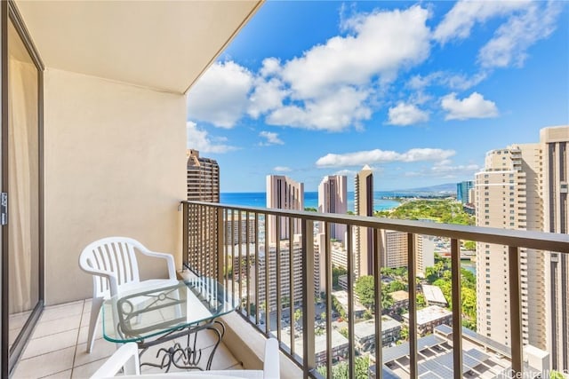 balcony featuring a water view