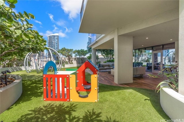 view of play area featuring an outdoor living space