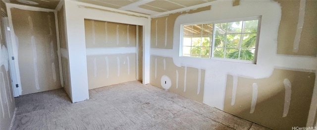 unfurnished bedroom featuring a closet