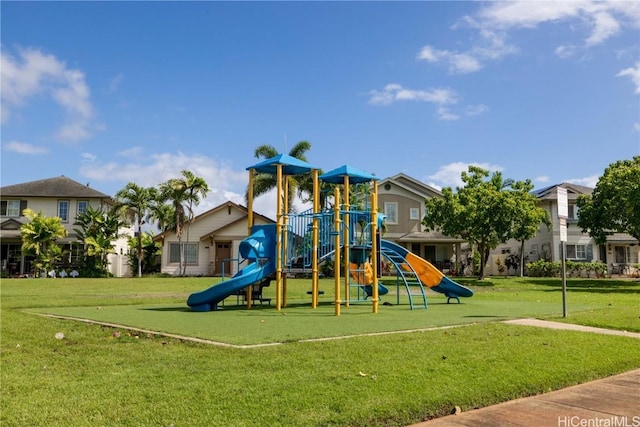 view of jungle gym with a lawn