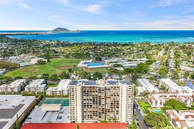 birds eye view of property with a water and mountain view