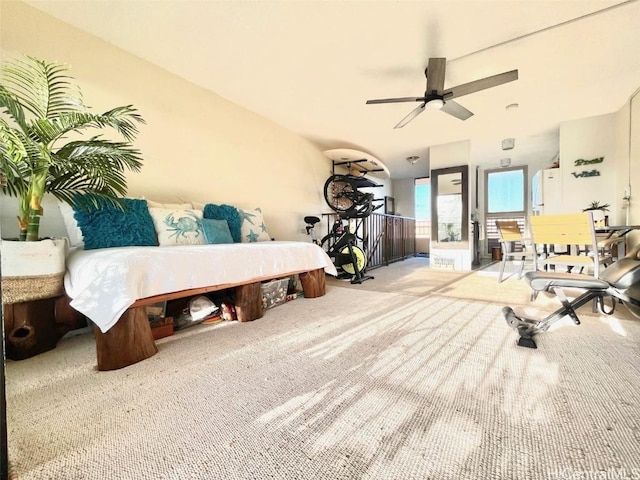 bedroom with ceiling fan and carpet floors