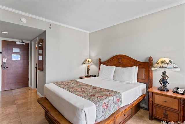 bedroom with ornamental molding