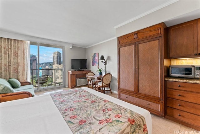 tiled bedroom featuring access to exterior and crown molding