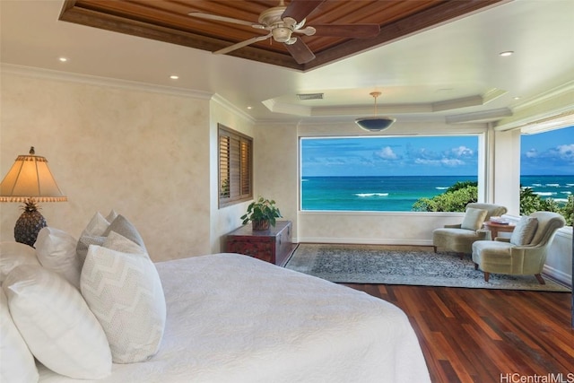 bedroom featuring crown molding, ceiling fan, dark hardwood / wood-style floors, and a raised ceiling