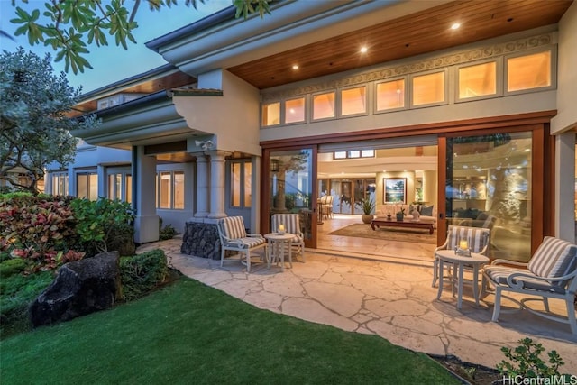 rear view of house with a patio