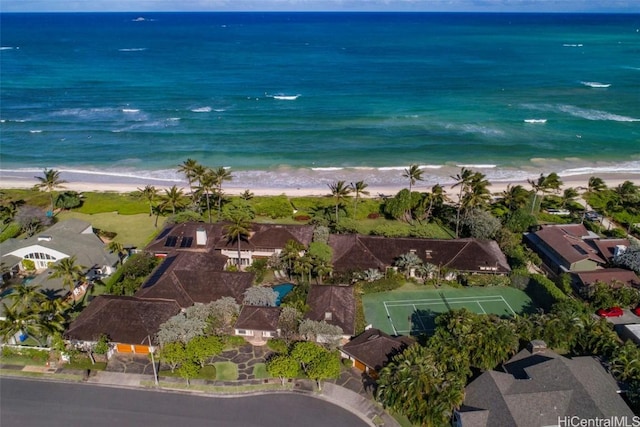 birds eye view of property featuring a water view and a view of the beach