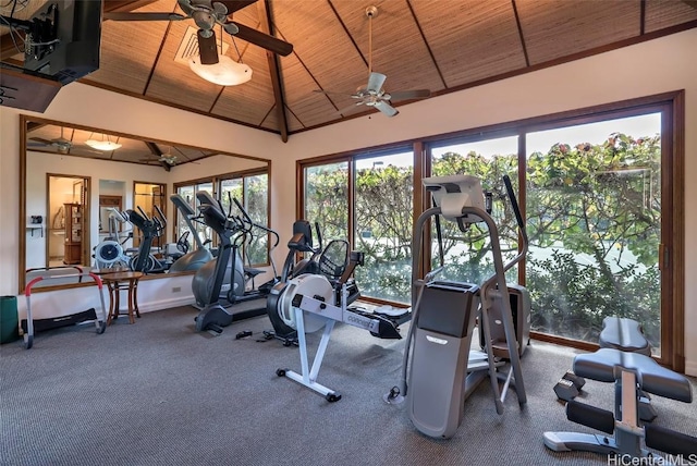 exercise room featuring wood ceiling, ceiling fan, and high vaulted ceiling