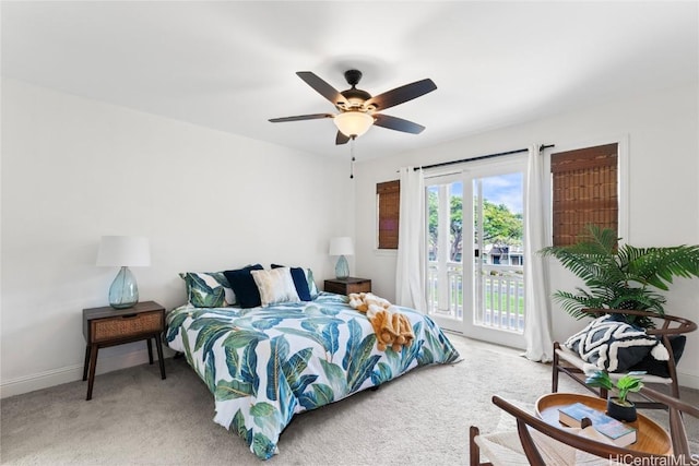 bedroom with a ceiling fan, access to outside, light colored carpet, and baseboards