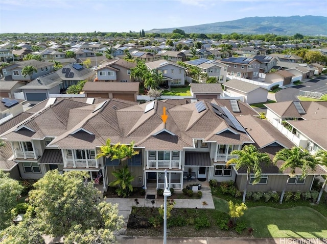 aerial view featuring a mountain view and a residential view