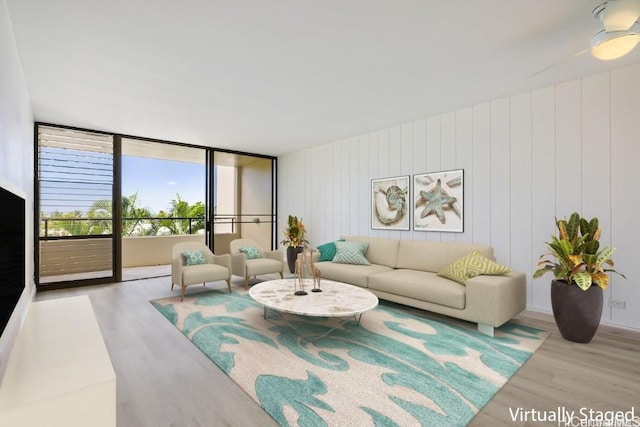 living room with light hardwood / wood-style flooring