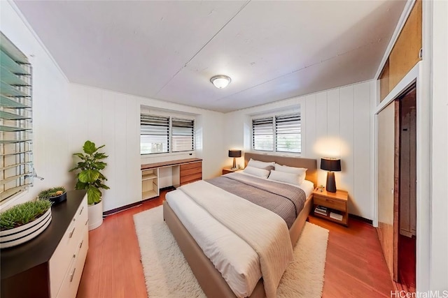 bedroom featuring wood finished floors