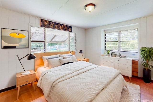 bedroom featuring light wood finished floors