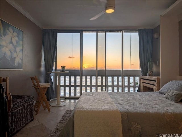84-965 Farrington Hwy Unit A604, Waianae, HI 96792 - tiled bedroom featuring crown molding, ceiling fan, a water view, expansive windows, and access to outside