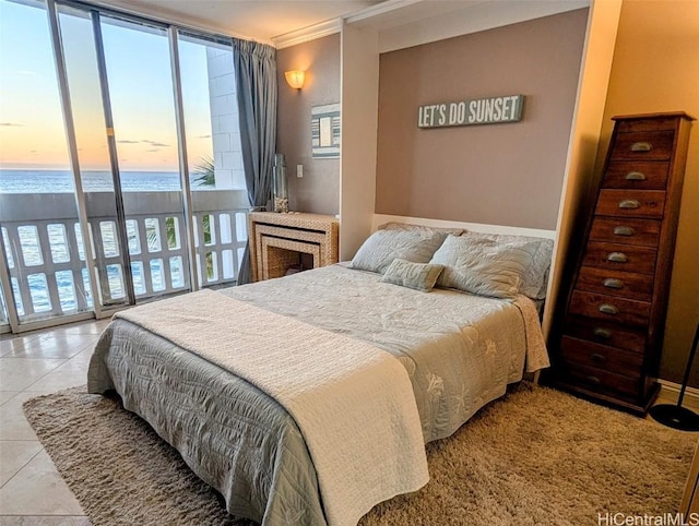 84-965 Farrington Hwy Unit A604, Waianae, HI 96792 - bedroom with expansive windows, a water view, access to outside, and light tile patterned floors