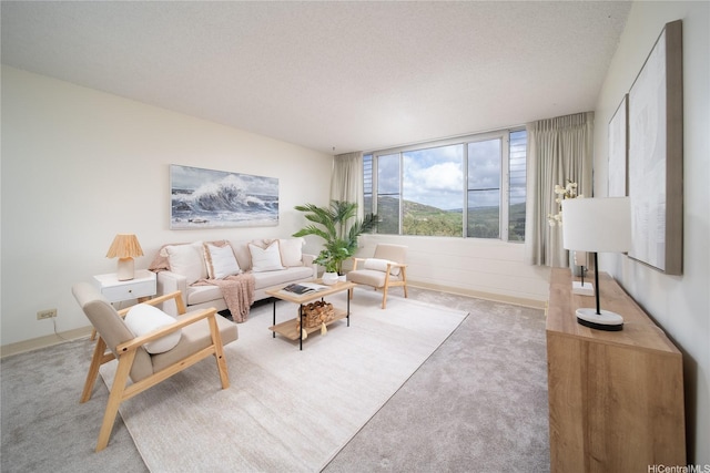 3030 Ala Ilima St Unit 907, Honolulu, HI 96818 - carpeted living area featuring a textured ceiling