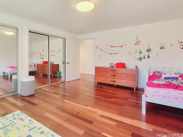 bedroom featuring hardwood / wood-style flooring