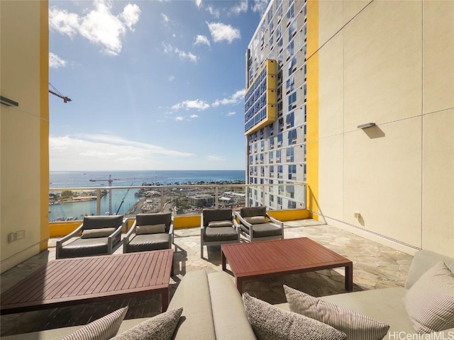 view of patio featuring a water view and an outdoor hangout area