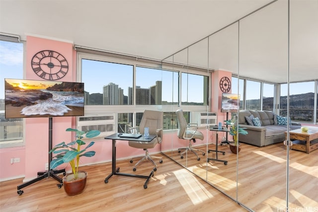 sunroom / solarium with a city view