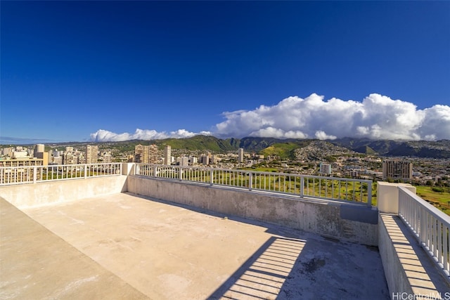 view of patio / terrace with a mountain view