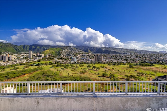 mountain view featuring a view of city