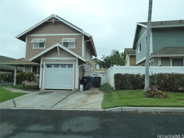 view of front facade featuring a garage and a front yard