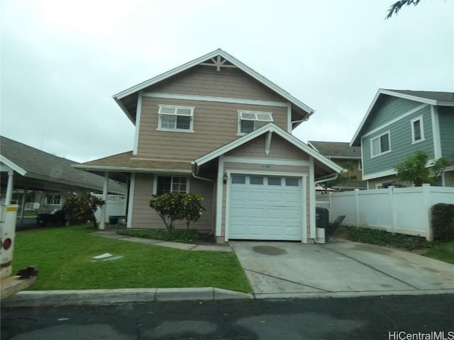 view of front of house featuring a garage and a front lawn