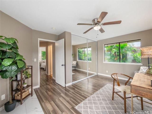 office area featuring hardwood / wood-style flooring and ceiling fan