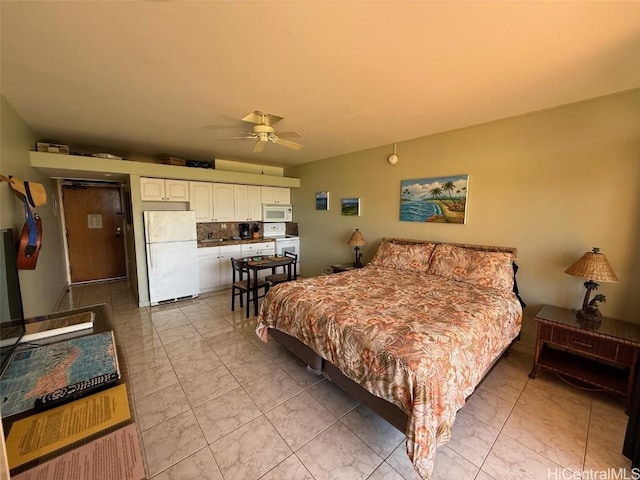 bedroom with white fridge