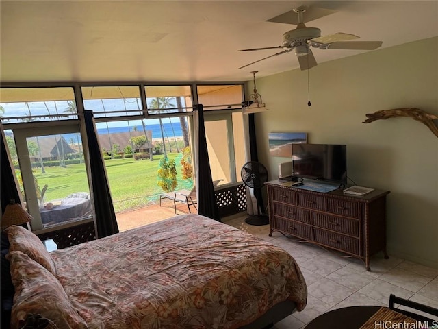 tiled bedroom with access to exterior