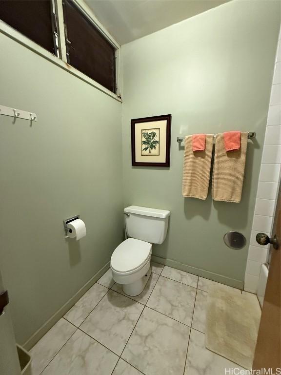 bathroom featuring toilet