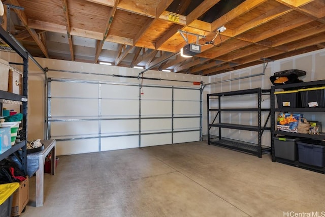 garage featuring a garage door opener