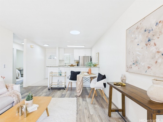 living room featuring light wood-style flooring