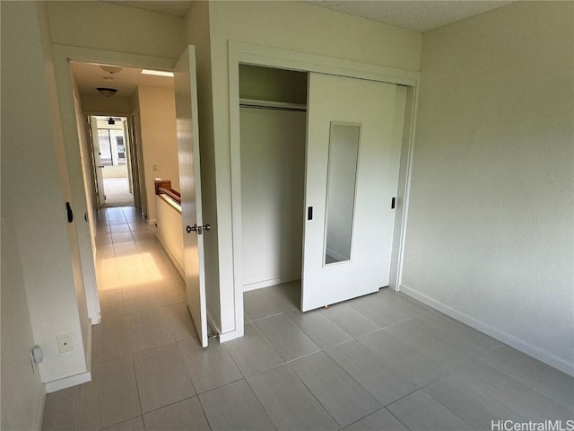 unfurnished bedroom featuring a closet