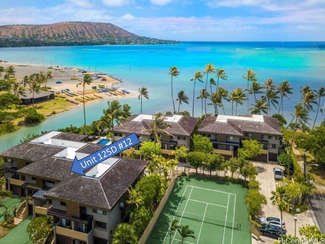 bird's eye view featuring a beach view and a water view