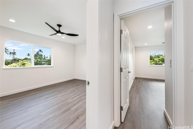 hallway featuring light wood-type flooring