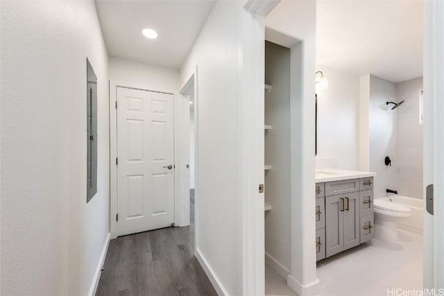 hallway featuring light hardwood / wood-style floors