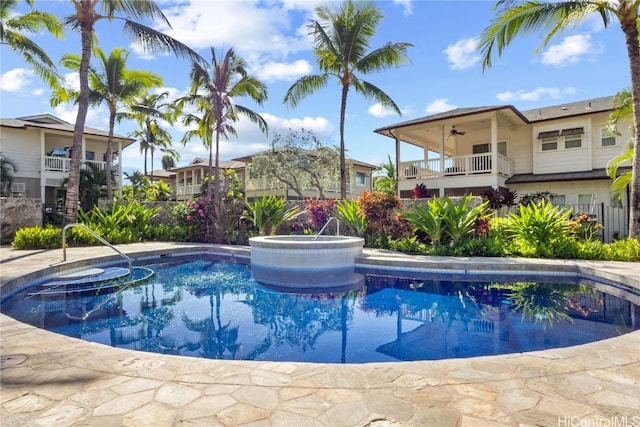 view of swimming pool with ceiling fan