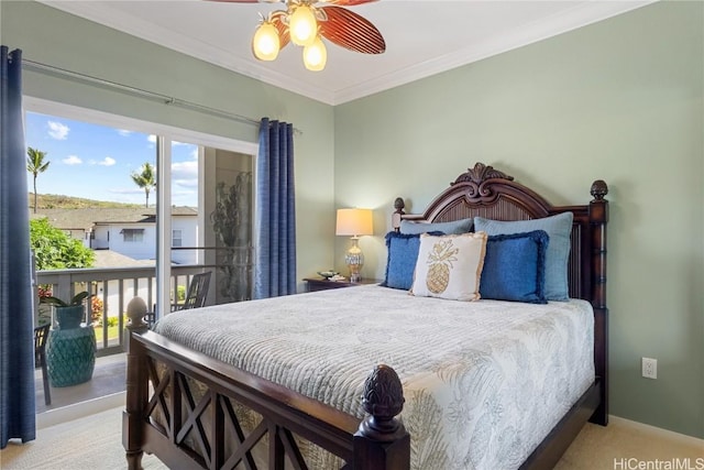 carpeted bedroom with ceiling fan and ornamental molding