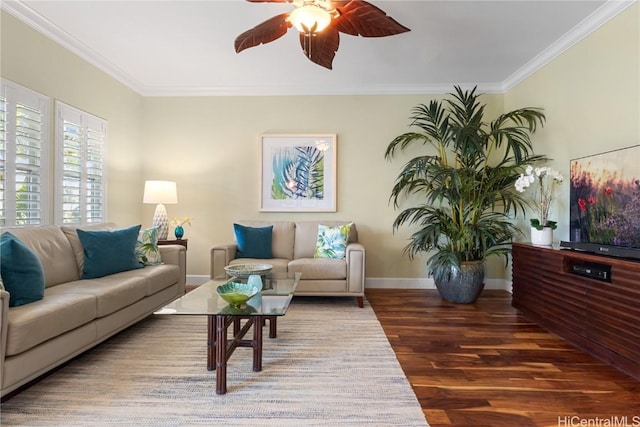 living room with crown molding, ceiling fan, and dark hardwood / wood-style flooring