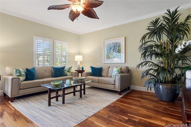 living room with wood-type flooring and crown molding